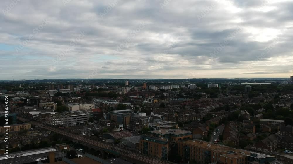 Ariel landscape view of cloudy East London skyline looking towards Bethnal Green and Cambridge Heath from London Fields. Mix of architecture styles and overground railway tracks. Ariel landscape view of cloudy East London skyline looking towards Bethnal Green and Cambridge Heath from London Fields. Mix of architecture styles and overground railway tracks.