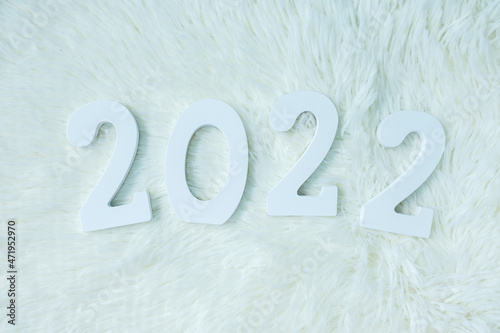 2022 white text number on white background. Resolution, plan, review, goal, start and New Year holiday concepts