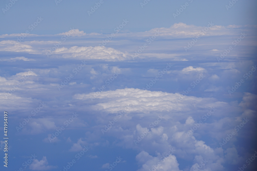 bird eye view of blue sky with clouds from airplane