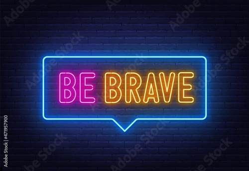 Be Brave neon sign on brick wall background.