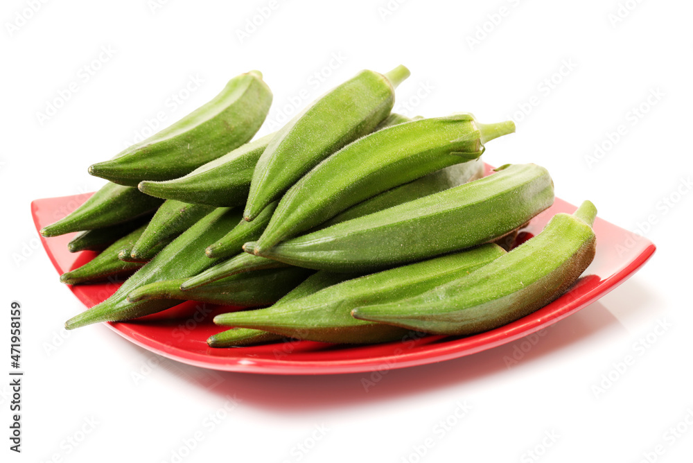 Fresh young okra isolated on white background Fresh young okra isolated on white background