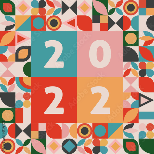 Happy new year 2022 banner in abstract geometric shape design. 2022 lettering in colorful cubisme art. Trendy bauhaus 2022 typography. Happy new year card in memphis style.