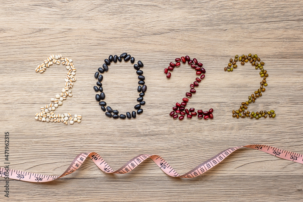 2022 New Year and New You with organic Beans; red, black, white, green and Adlay on table. Goals, Healthy, Motivation, Resolution, Weight loss, dieting and world food day concept 2022 New Year and New You with organic Beans; red, black, white, green and Adlay on table. Goals, Healthy, Motivation, Resolution, Weight loss, dieting and world food day concept