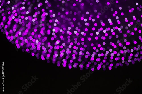 Holiday border of Purple bokeh lights
