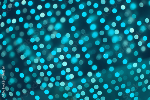 Holiday Blue background of Many small bokeh lights