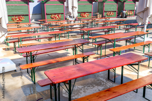 fairground and empty tables prepared for new year celebrations photo