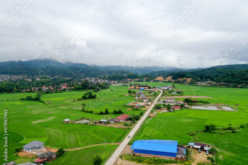 Scenic aerial view flying over the land field.