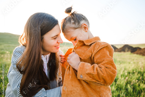 Mom and son are active in nature.