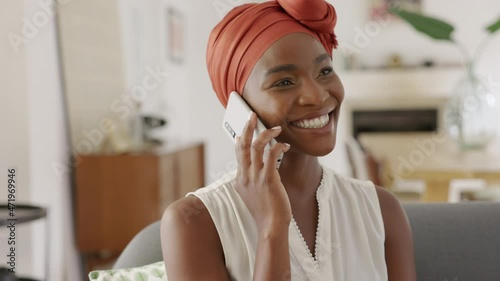 Mature african woman talking over phone