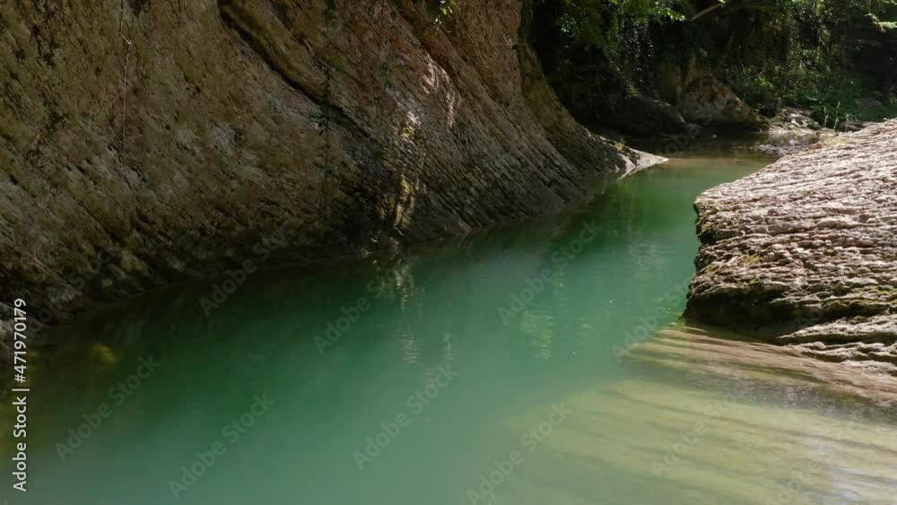 The Great Caucasian Ridge. Flying over the canyon of the Kudepsta River. Subtropical forest.