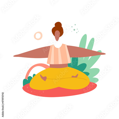 Swarthy young woman doing exercise on the mat