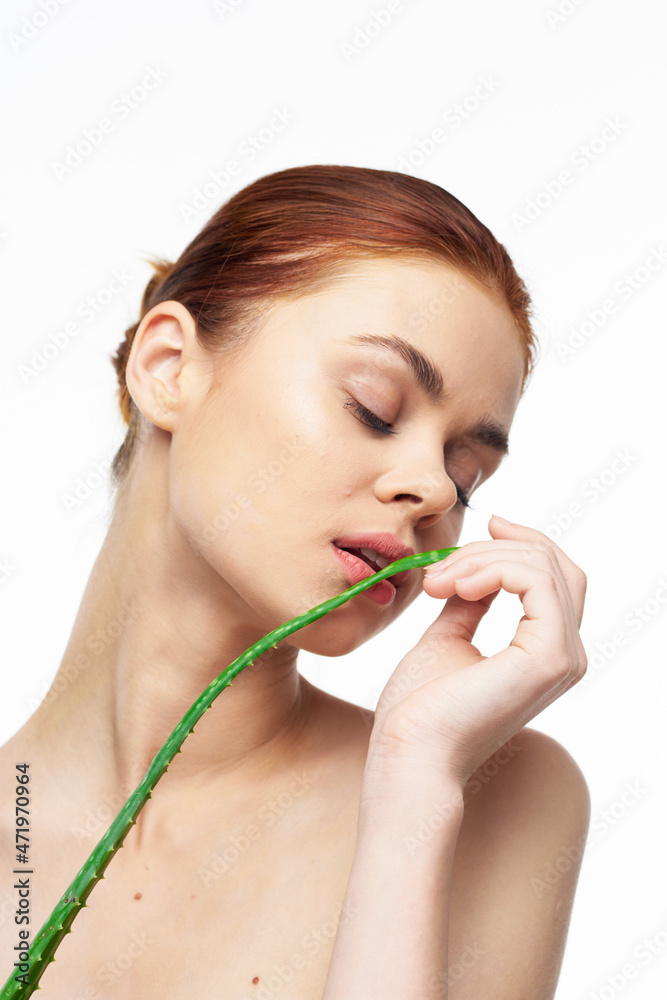 woman with bare shoulders aloe cosmetics spa treatments