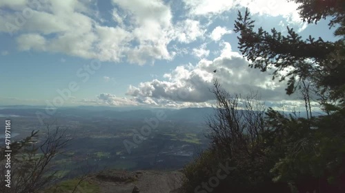 Mount Prevost, Vancouver Island. Rocky cliffs and tree-covered forest. photo