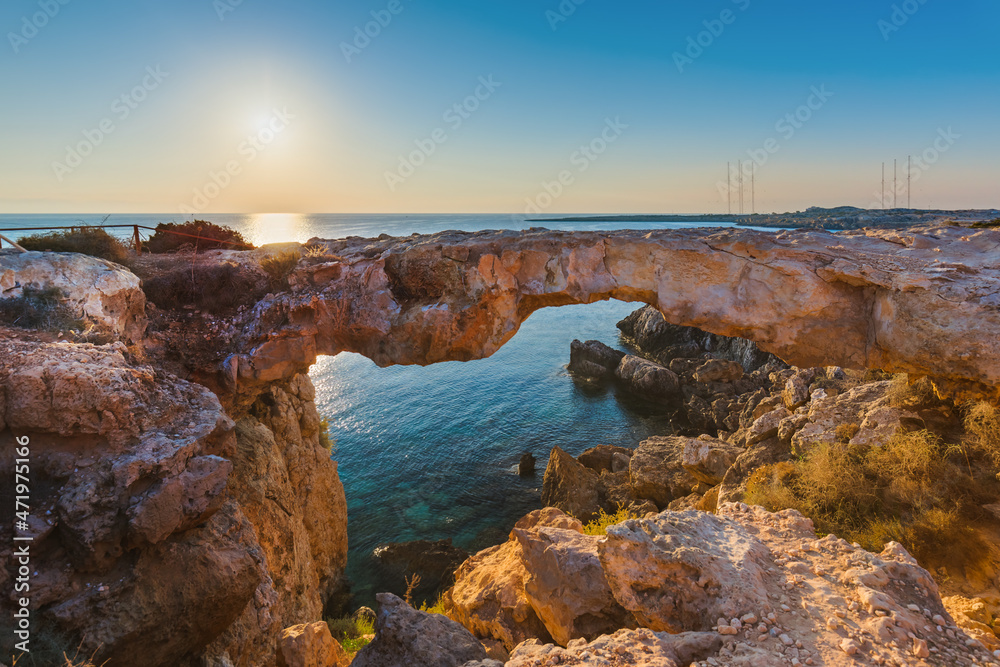 Obraz premium Famous stone Sin Bridge at sunrise in Ayia Napa Cyprus