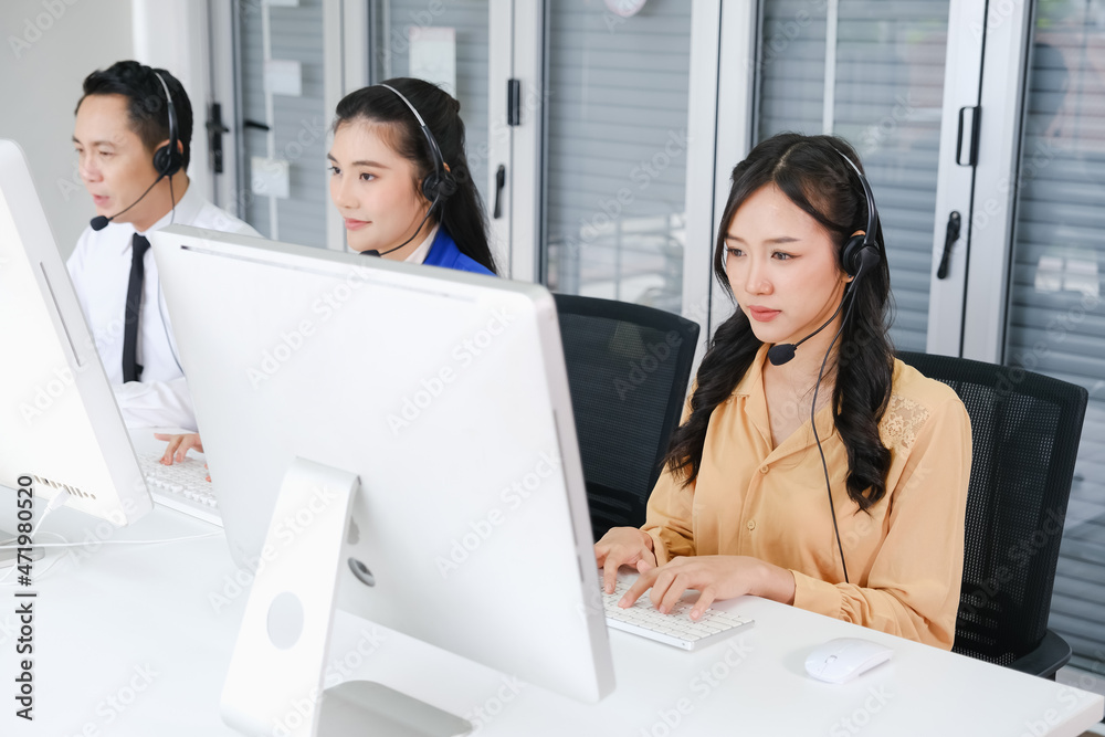 team call center operator with headset in office team call center operator with headset in office