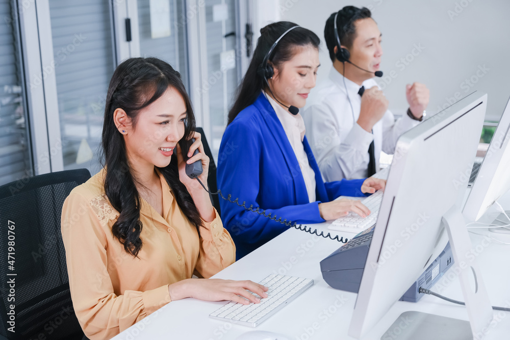 team call center operator with headset in office team call center operator with headset in office