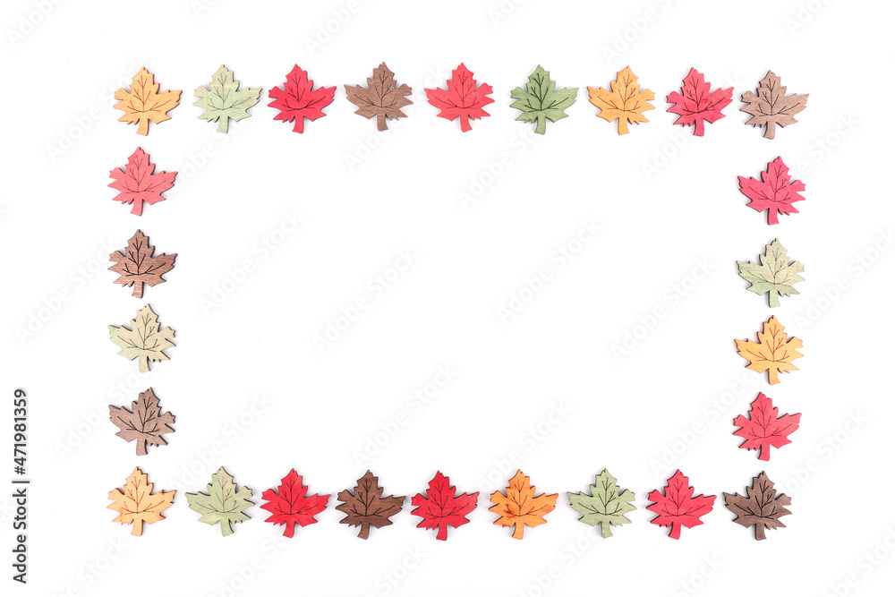 A rectangle made up out of decorative wooden leaves
A rectangle made up out of decorative wooden leaves