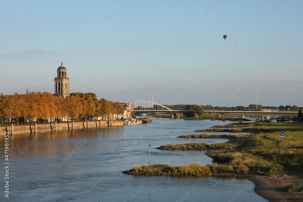 A panoramic view on the city of Deventer in the Netherlands and the river Ijssel in autumn
