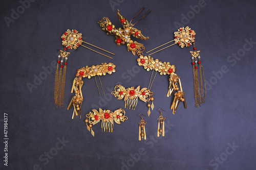 Schilderij op canvas Chinese traditional hairpins hair clips on a grey concrete background