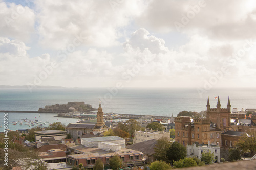View of the town of Saint Peter Port from the top of the hill in the morning light, Guernsey
