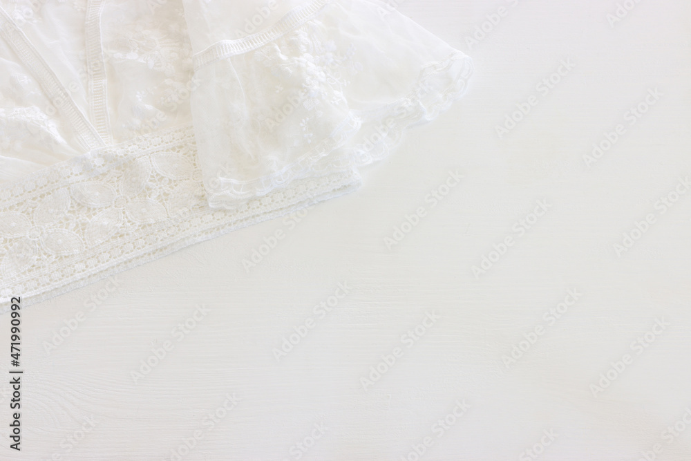 Background of white delicate lace clothing Background of white delicate lace clothing