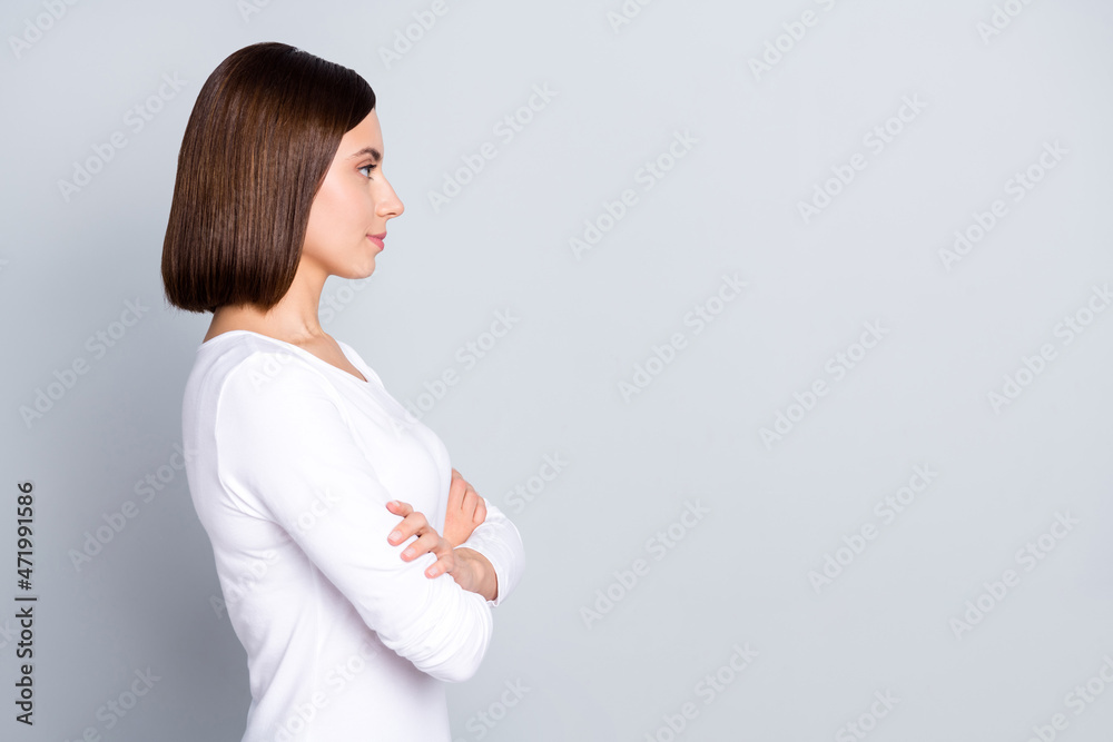 Profile photo of boss brunette millennial lady crossed arms look promo wear white outfit isolated on grey color background Profile photo of boss brunette millennial lady crossed arms look promo wear white outfit isolated on grey color background