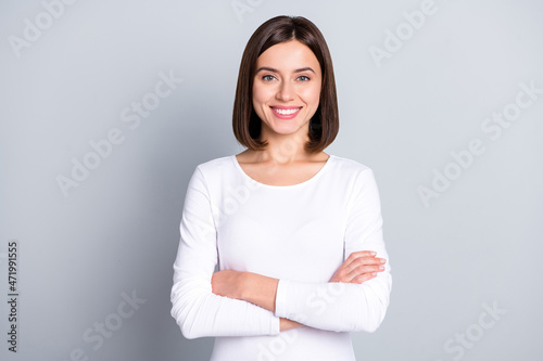 Fotobehang Photo of teacher brunette millennial lady crossed arms wear white outfit isolate