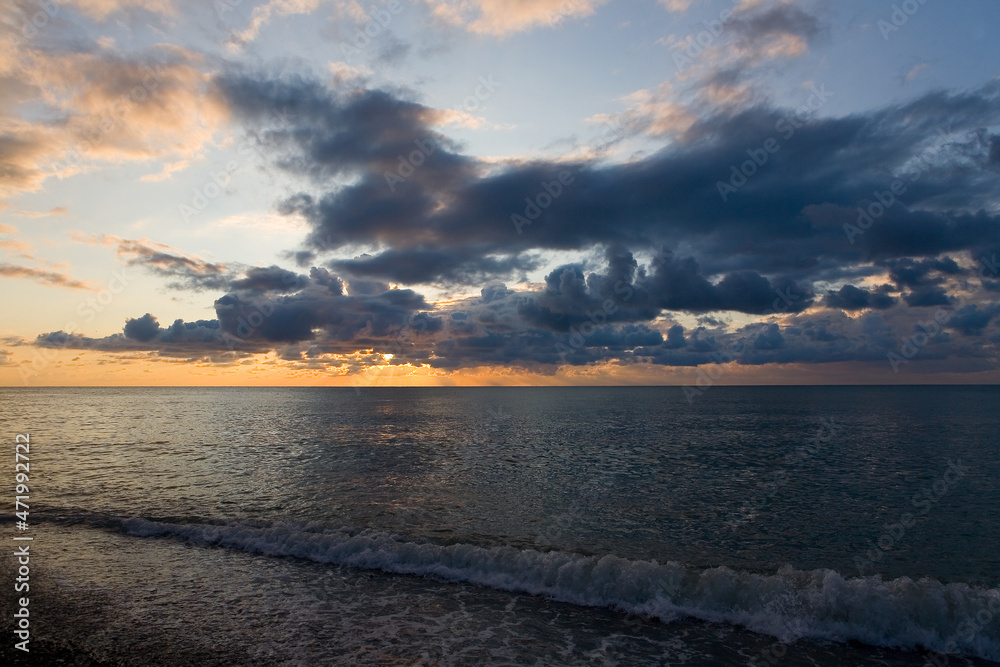 Clouds in the sky and sea at sunset.