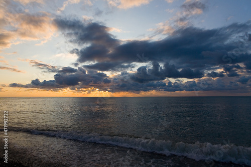 Obraz na płótnie Clouds in the sky and sea at sunset. w salonie