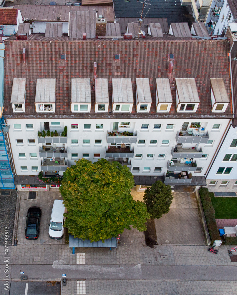 District of Giesing in Munich city seen from above. Aerial drone view of an European city