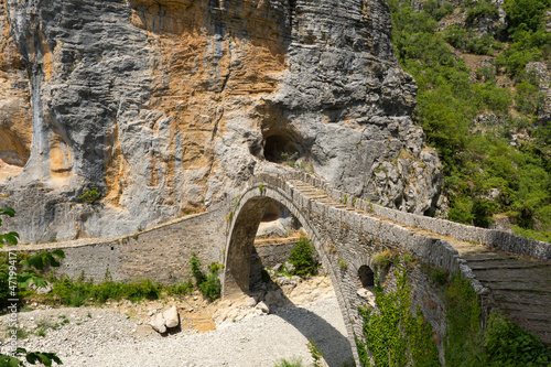 Daytime view of Kokkori Bridge in the national of Vikos-Aoos in northern Greece photo