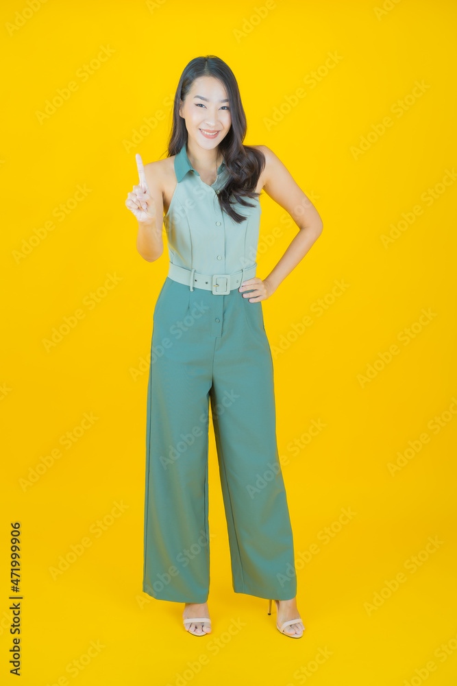 Portrait beautiful young asian woman smile with action Portrait beautiful young asian woman smile with action
