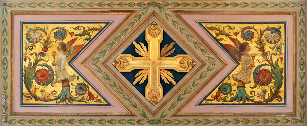 FERRARA, ITALY - NOVEMBER 9, 2021: The mannierism painting with the cross on the side altar in church Chiesa di San Francesco.