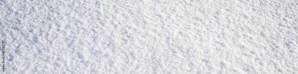 Natural snow. White abstract background. Winter. Snow surface background with copy space for design. Web banner. Website header.