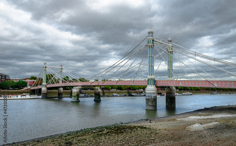 Albert Bridge, a road bridge over the Tideway of the River Thames connecting Chelsea to Battersea in London, UK.