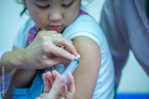 Doctors are vaccinating children for protection.