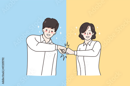 Friendship, collaboration and and mutual support concept. Young smiling colleagues man and woman standing and bumping fists from both sides blue and yellow vector illustration 