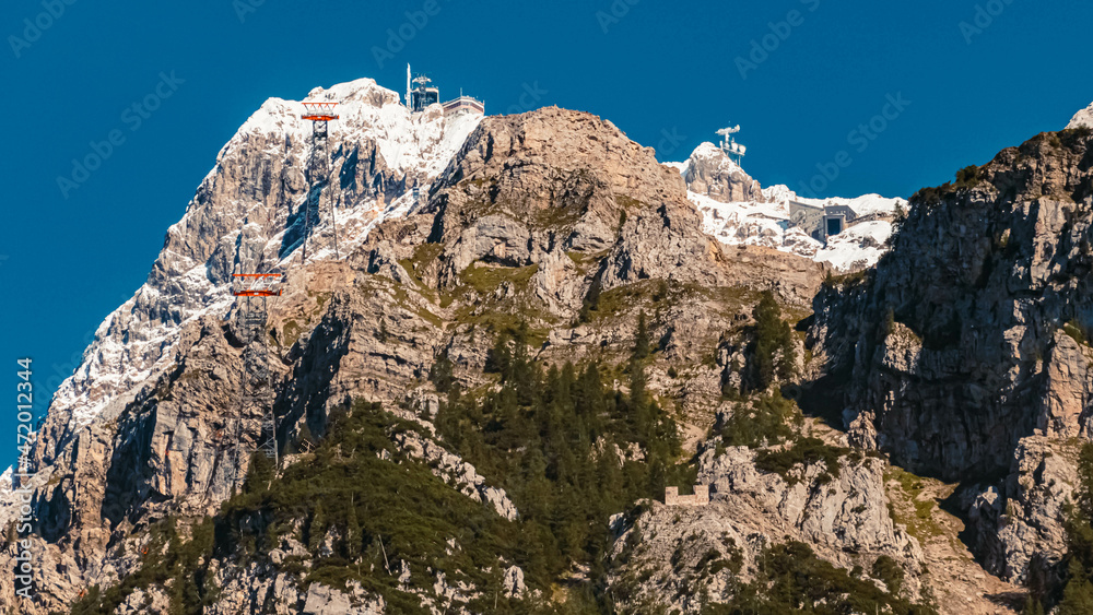 Beautiful alpine summer view at the famous Zugspitze summit, top of Germany, near Ehrwald, Tyrol, Austria and Garmisch-Partenkirchen, Bavaria, Germany