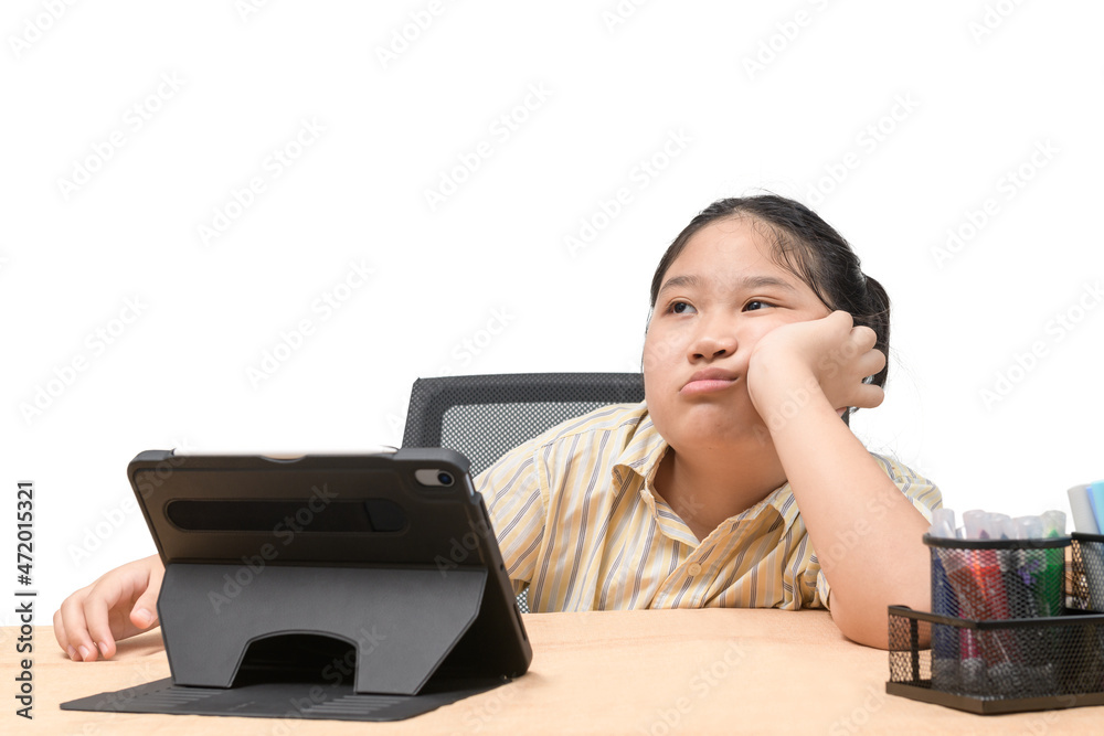 School girl watching online education classes feeling bored and depressed at home. School girl watching online education classes feeling bored and depressed at home.