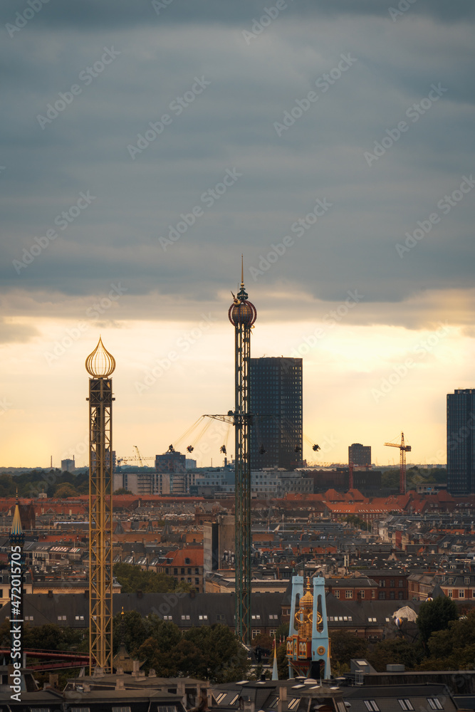 sunset over the city amusement park