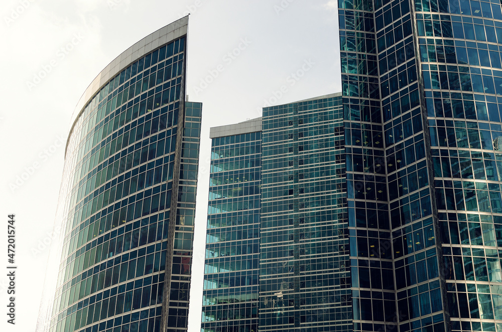 Obraz premium RUSSIA, MOSCOW: Bottom up scenic cityscape view of industrial glass skyscrapers 