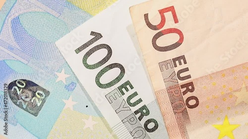 banknotes in denominations of 5 20 50 100 euros.