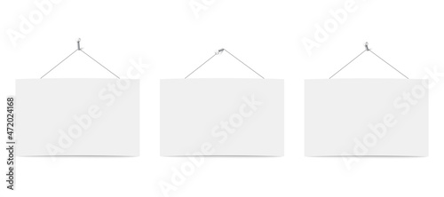 Set of three planks hanging from ropes on nails on white wall. Realistic vector illustration isolated on white background with shadows for template, poster, image or lettering