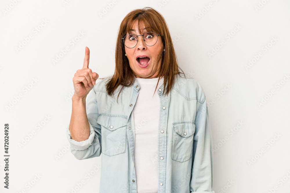 Middle age caucasian woman isolated on white background having some great idea, concept of creativity.