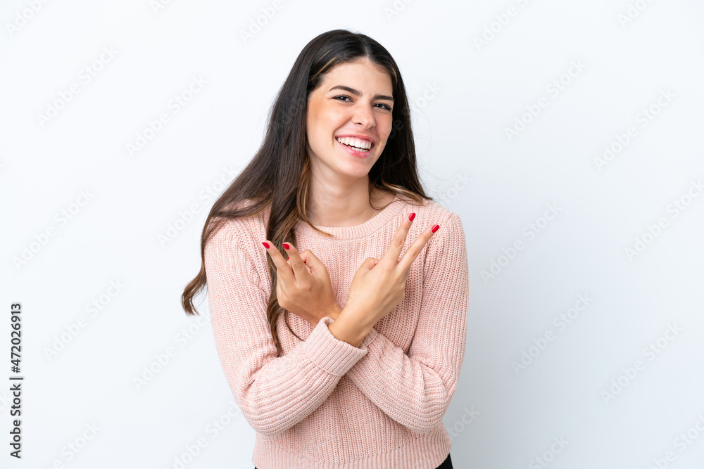 Obraz premium Young Italian woman isolated on white background smiling and showing victory sign