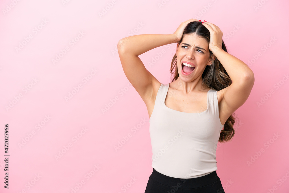 Young Italian woman isolated on pink background stressed overwhelmed Young Italian woman isolated on pink background stressed overwhelmed