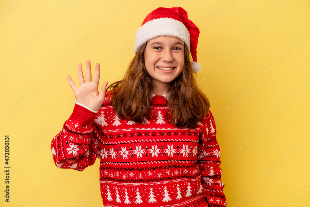 smiling cheerful showing number five with fingers. smiling cheerful showing number five with fingers.