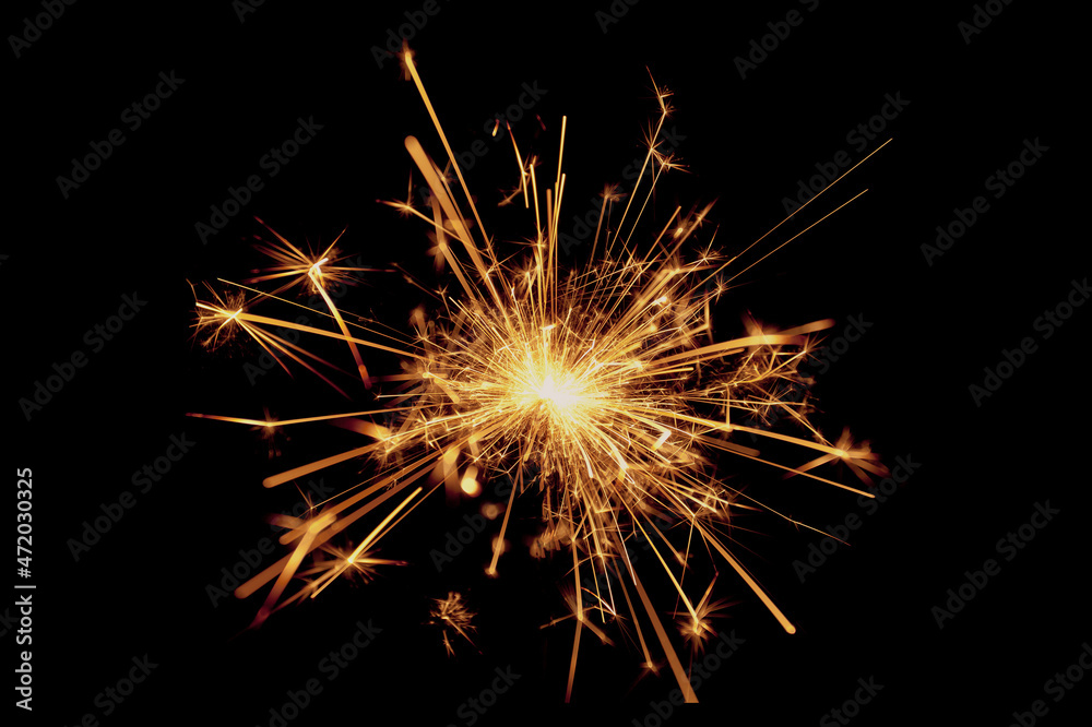 Burning sparklers isolated on black background