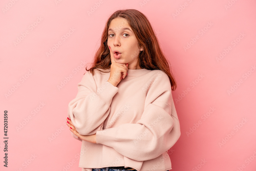Little caucasian girl isolated on pink background having some great idea, concept of creativity. Little caucasian girl isolated on pink background having some great idea, concept of creativity.