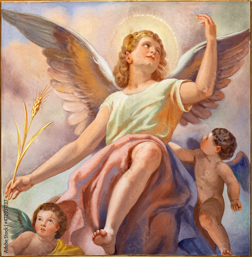 FORLÍ, ITALY - NOVEMBER 11, 2021: The fresco of angel with the spike in the Cattedrala di Santa Croce after renaissance painter Melozzo da Forlí by Giovanni Secchi (1876 - 1950). photo